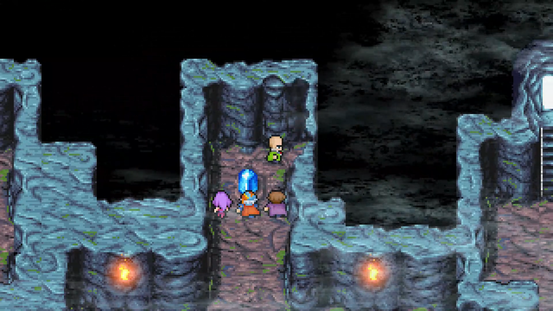 Josef turning the rock switch to reveal the hidden passage